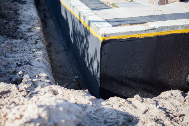 Professional Wet Basement Repair technician working in Monroeville, OH
